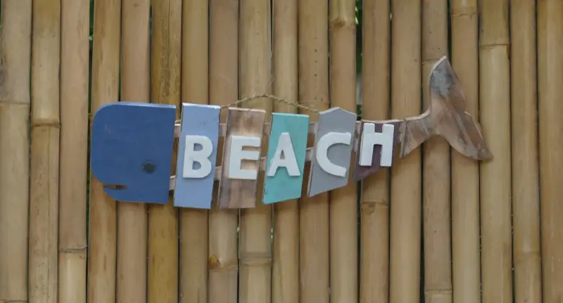 Product image of the product “Whale. Wooden sign to hang, in shape of a Whale with the letters 
